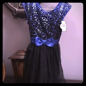 Girl’s dress size 10.  New